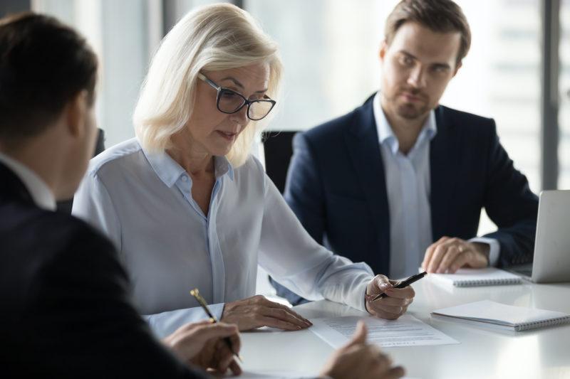 Business people going over documents